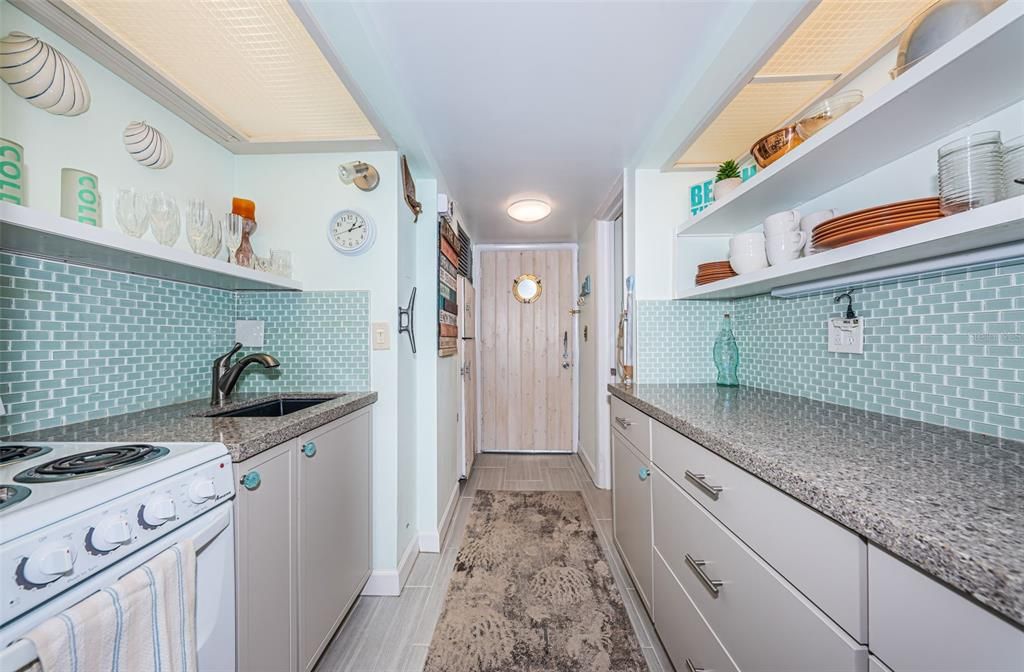 Kitchen with wood cabinets and granite counter tops