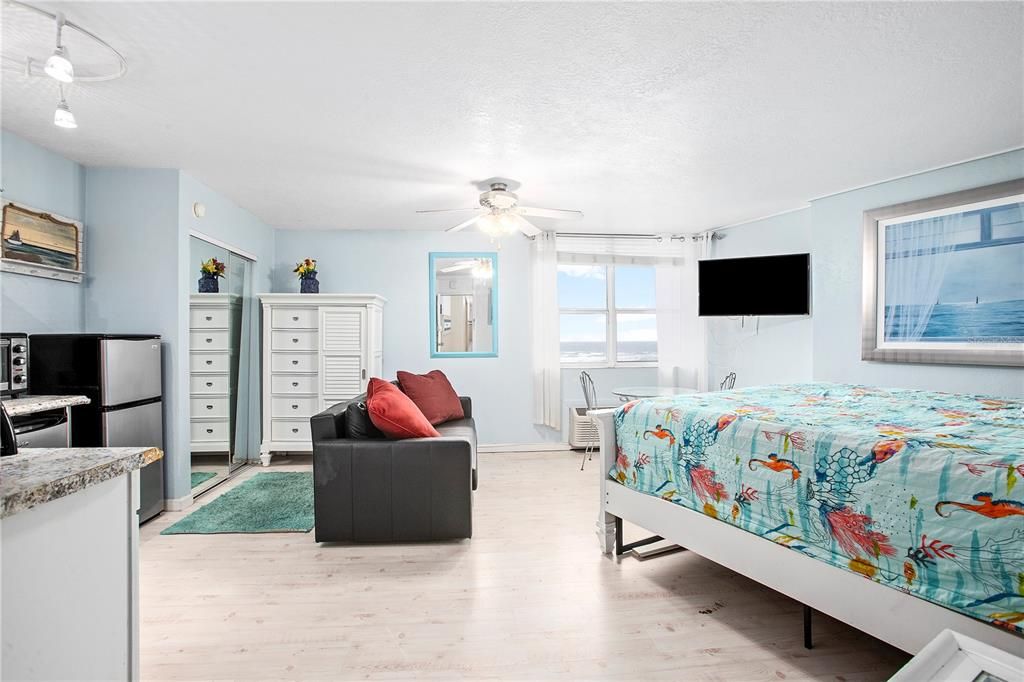 Interior looking from front door.  Closet and chest drawers on left.