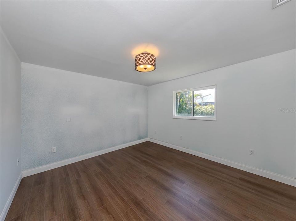 The main bedroom has a walk in closet and connects to the main bathroom.