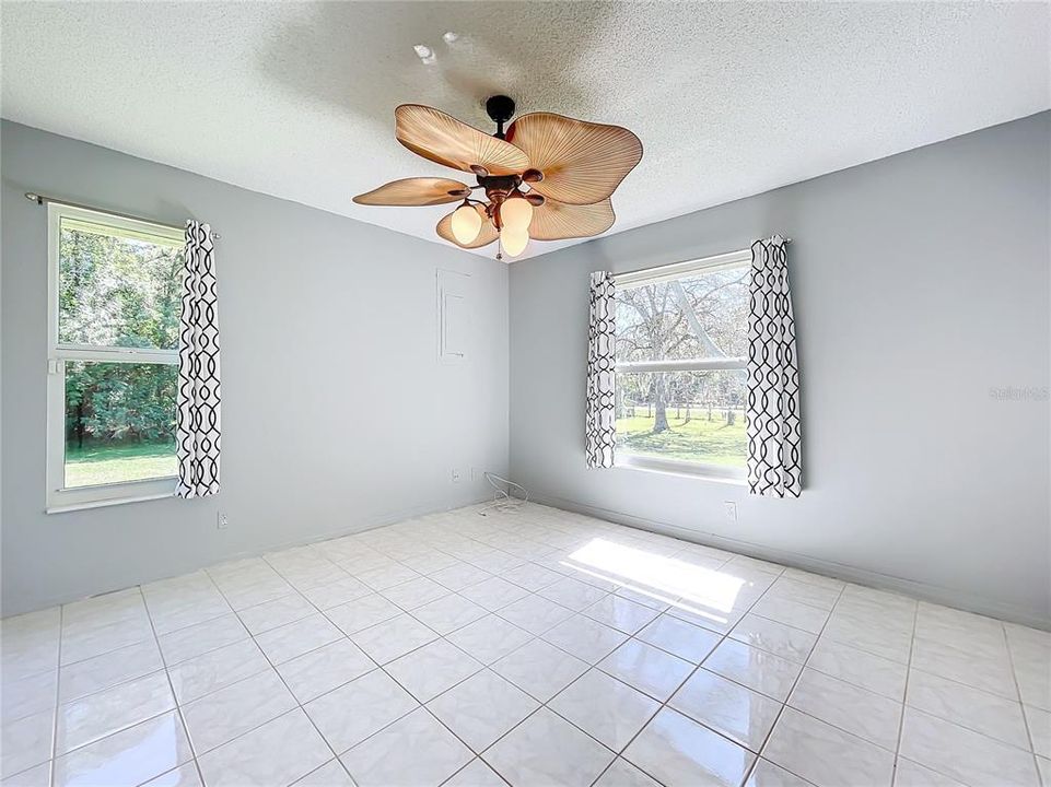 Bedroom 2 is light and airy