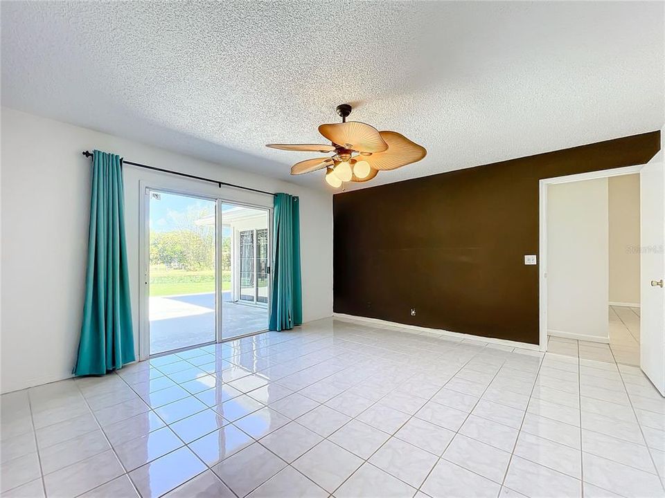 Sliding doors to paved patio from master bedroom