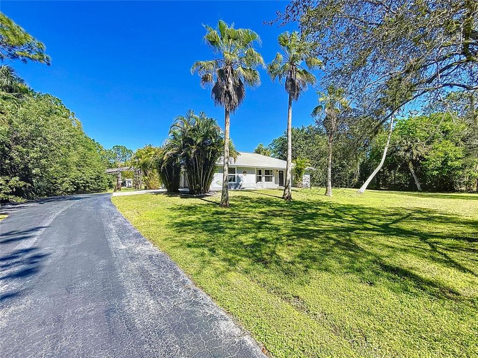 Paved driveway with electric gate