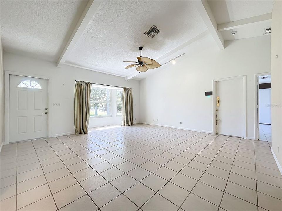 Living room with vaulted ceiling