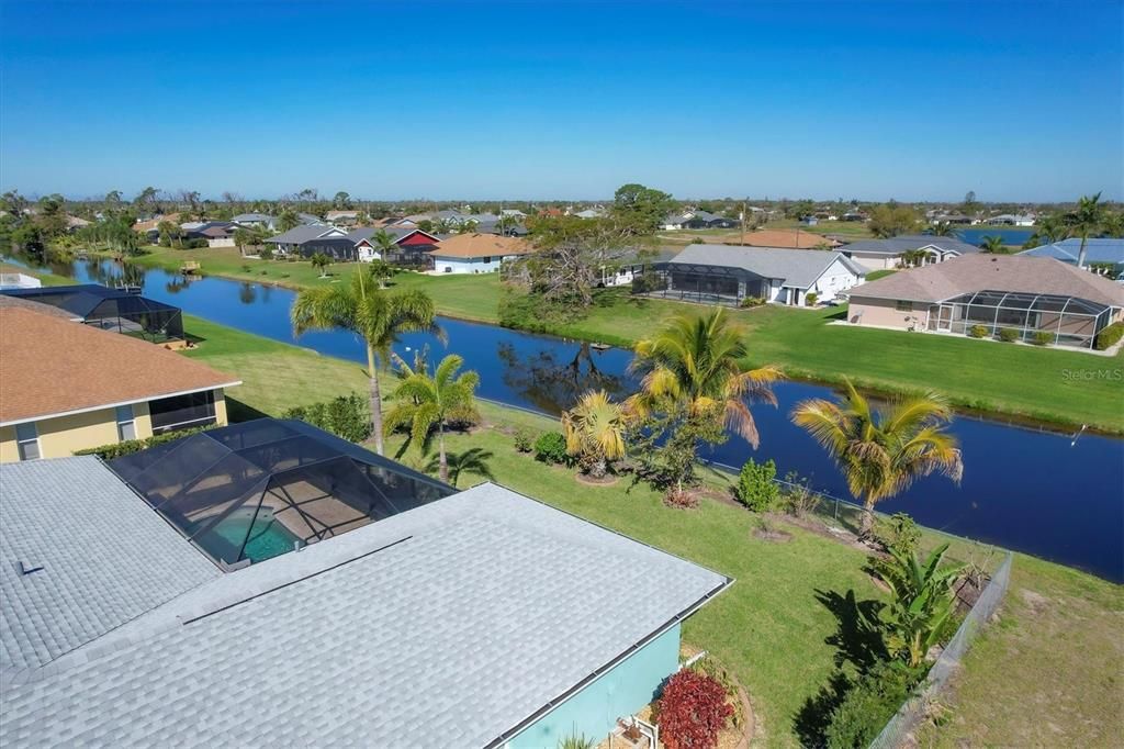 AERIAL OF HOME AND CANAL