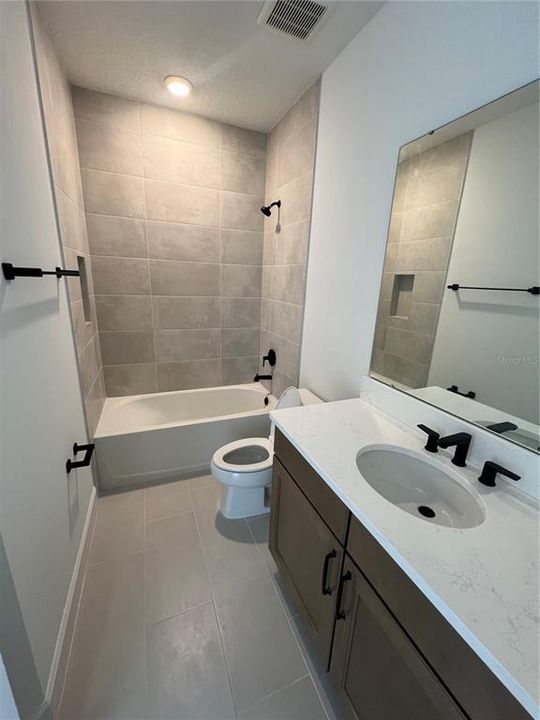 Shared bathroom on third level