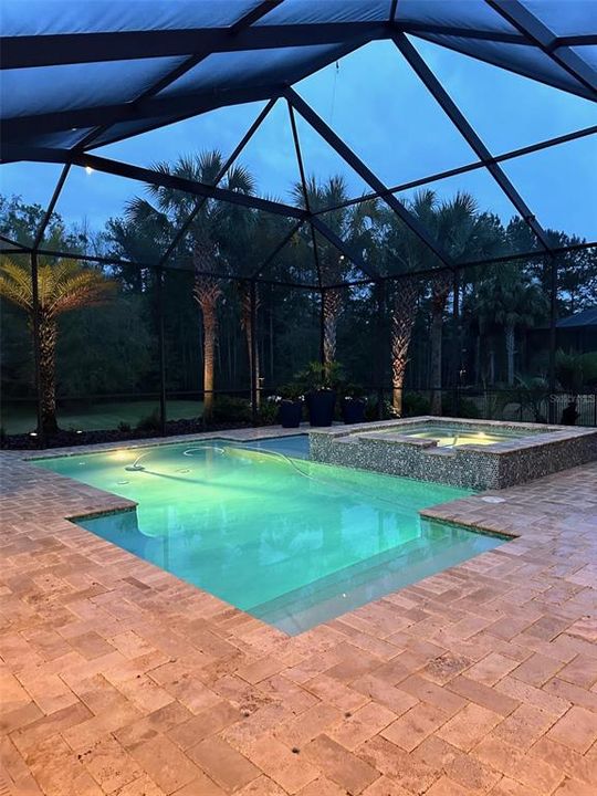 POOL AREA IN THE EVENING WITH LIGHTING