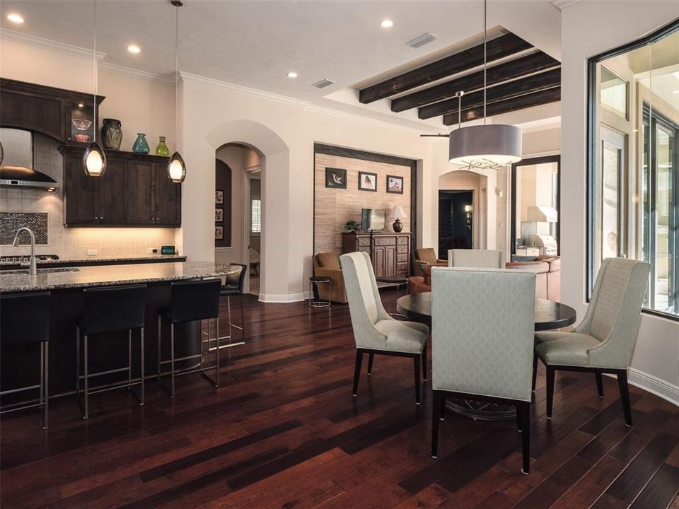 LOOKING FROM FRONT LIVING AREA THRU BREAKFAST ROOM TO SECOND LIVING SPACE