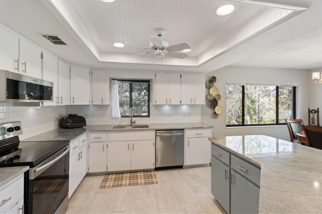 Updated Kitchen w/ Granite Countertops, White Subway Tile Backsplash, S/S Appliances & Tile Flooring