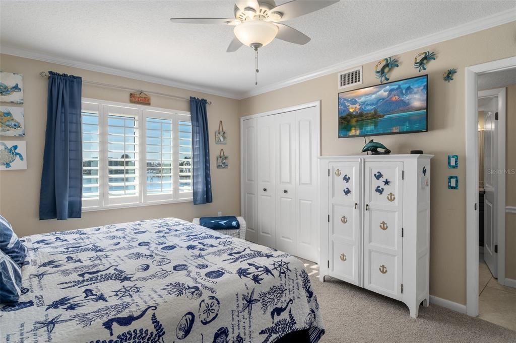 Guest bedroom with waterfront view