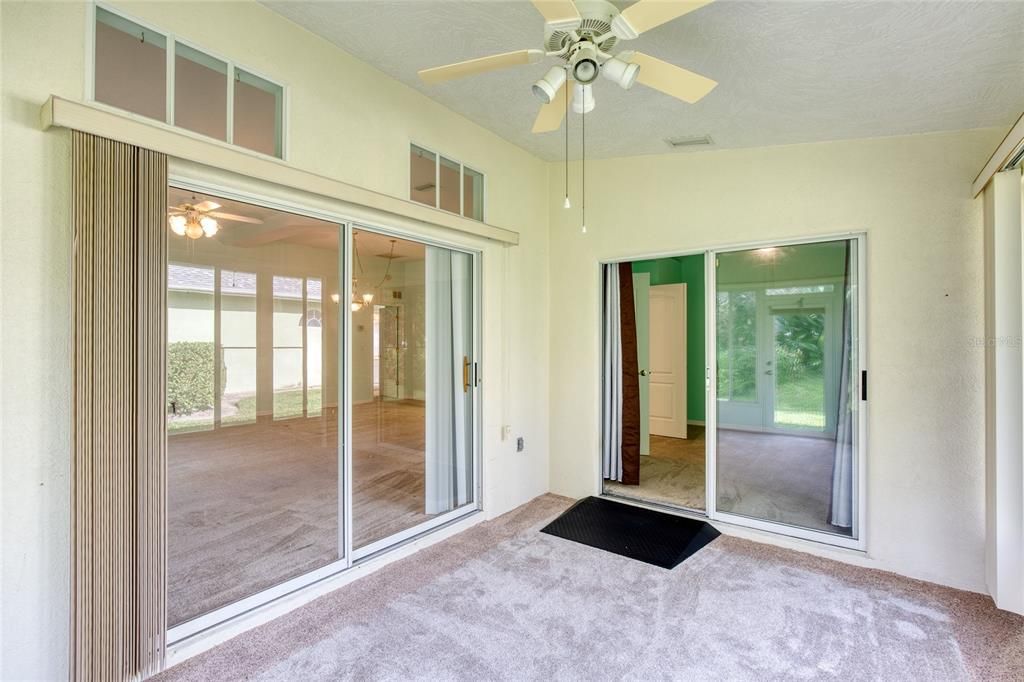 Florida Room/Porch 3-Tile under carpet.