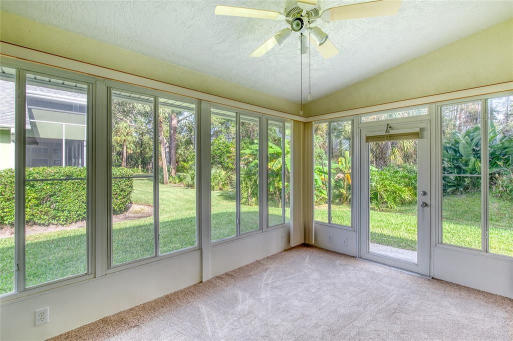 Florida Room/Porch 3-Tile under carpet.