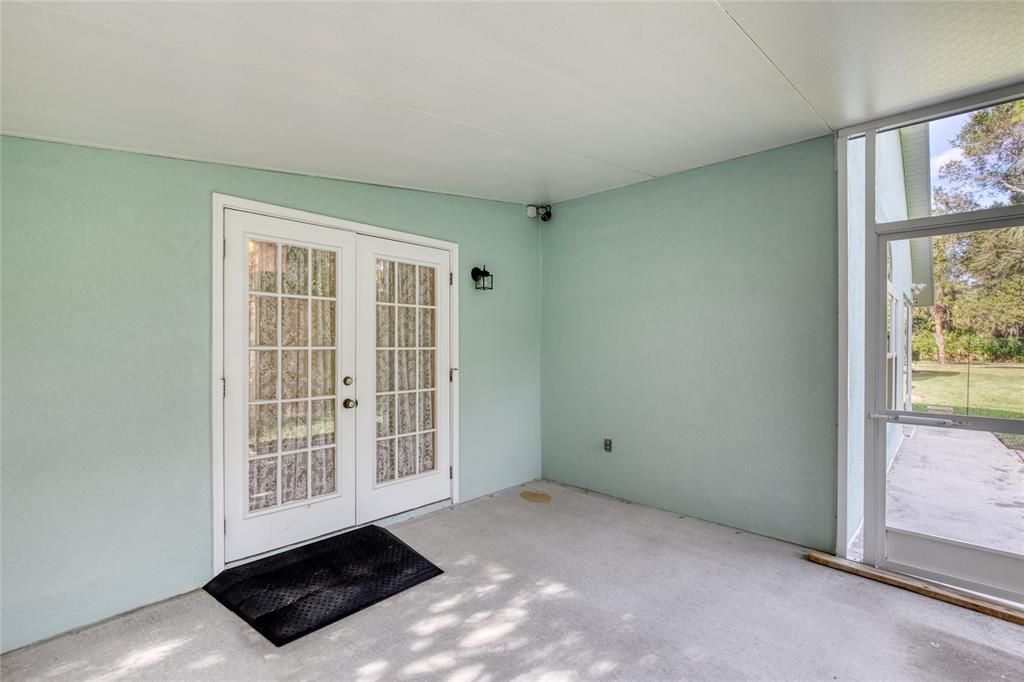 Owners private screened  porch off of suite.