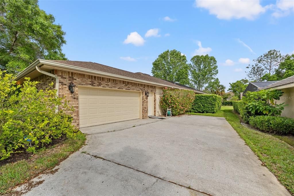 2 car garage with very wide and long driveway