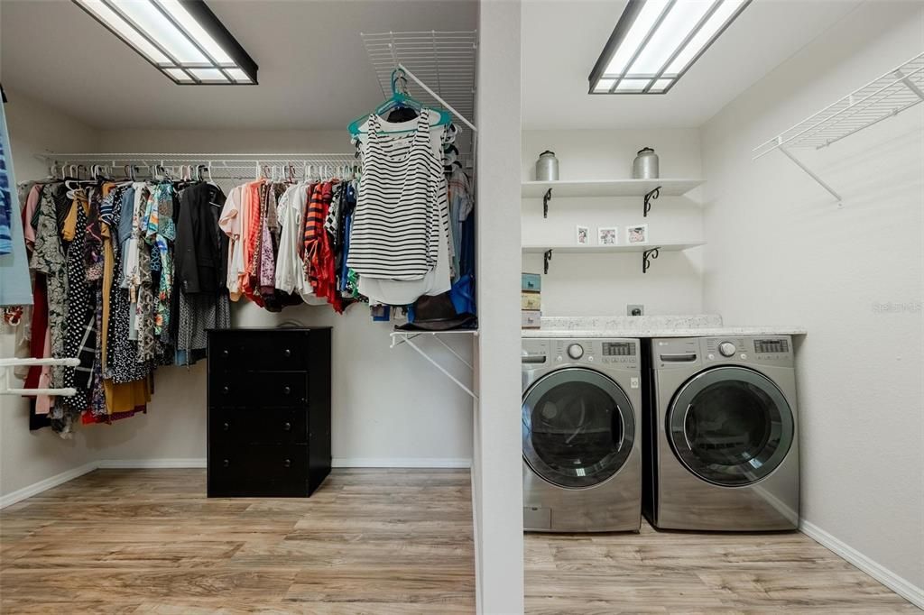 Huge walk in Primary closet attached to Laundry room for convenience and functionality.