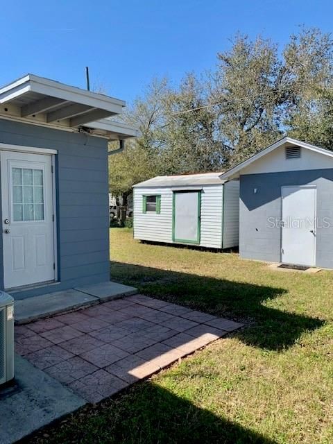 Backyard View with two Storage Units