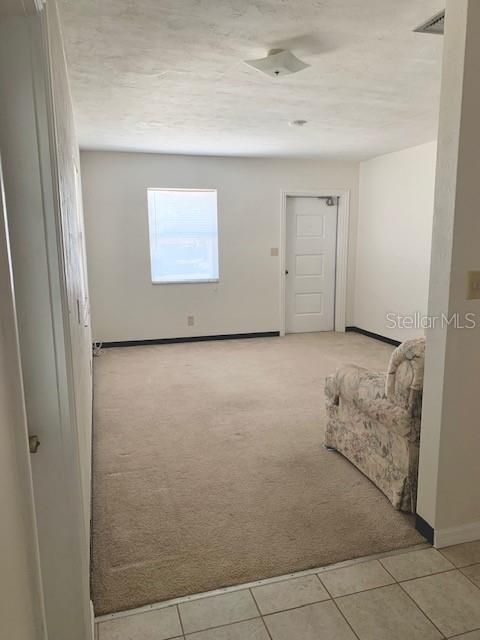 Looking into the Living Area (12.5 x 15 ft) toward the front door