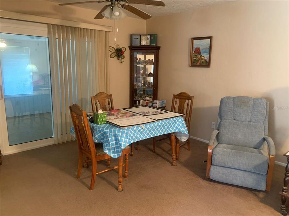 DINING SPACE TO ENCLOSED PORCH AREA