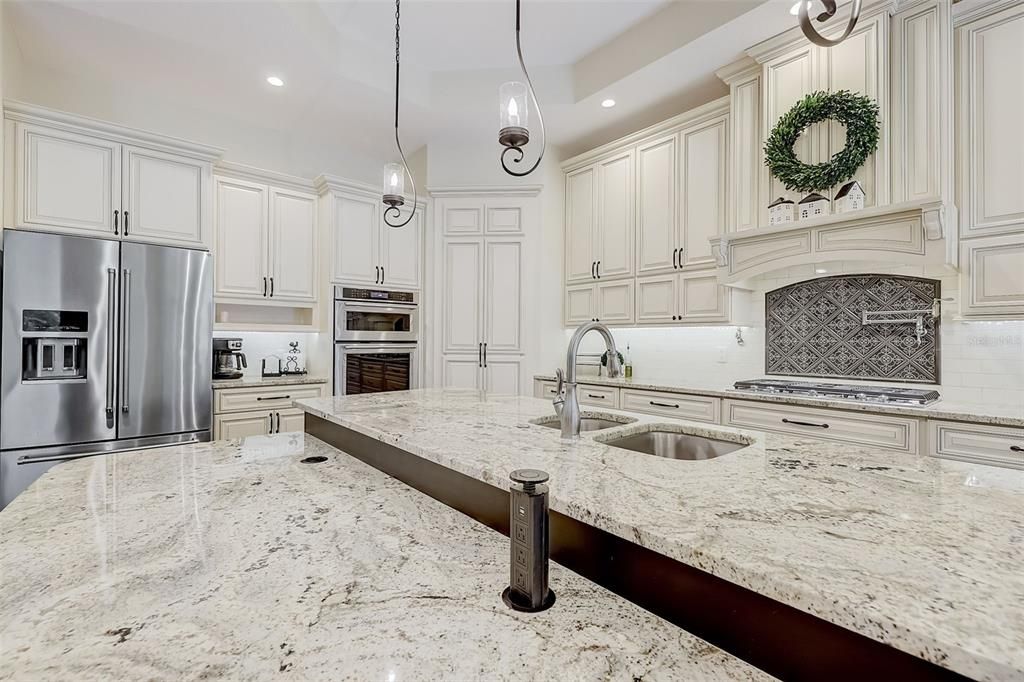 Kitchen Island has 2 hidden pull out electrical outlets