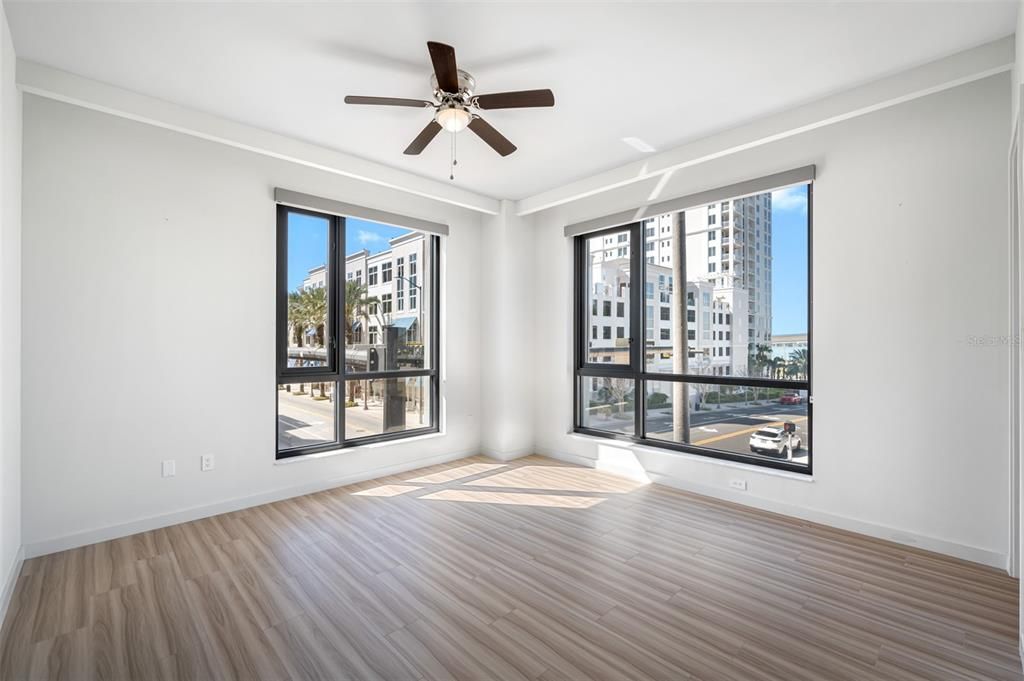 Master bedroom with views of Coachman Park and Cleveland Street, Downtown's main street