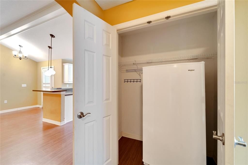 Large Closet Between Family Room & Kitchen