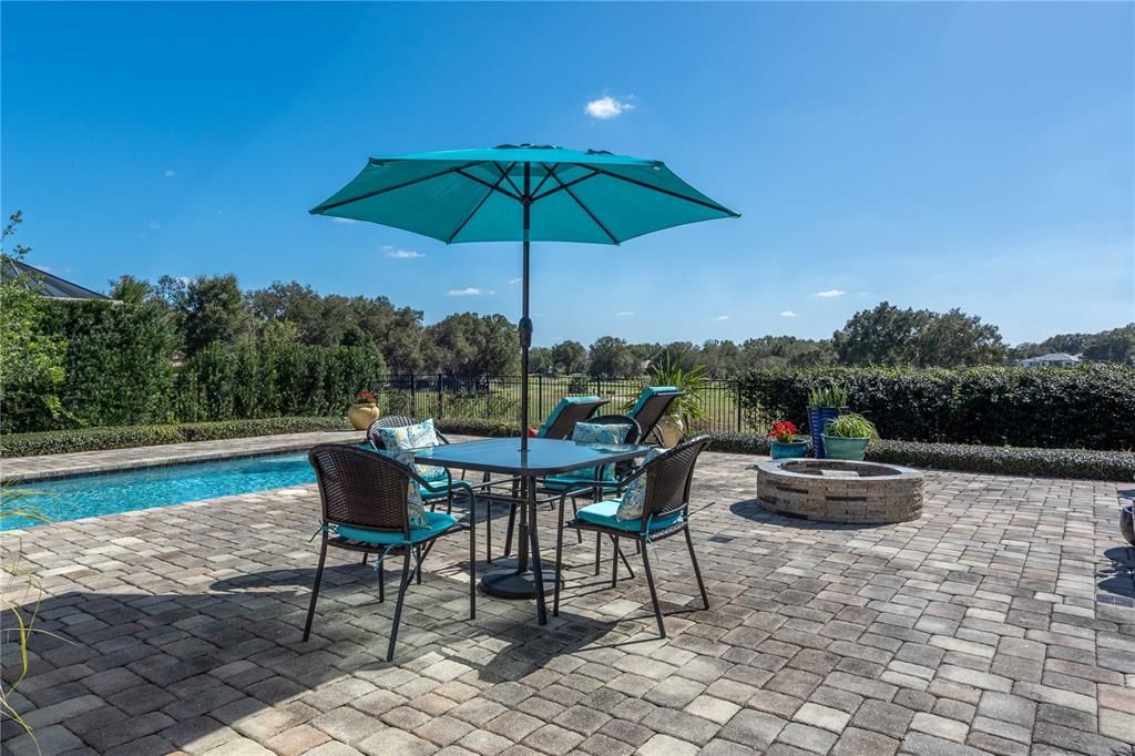 Pool Patio, fire pit overlooking the golf course fairways