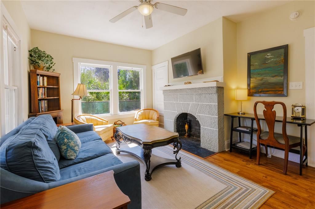 Apt 3 living room with fireplace