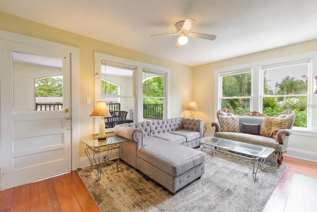 Apt 4 living room with view of porch door