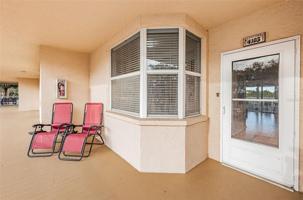 Spacious entry and balcony on this first floor unit.  Ground floor is parking garage. Parking space 12 for this unit is  ideally located near the elevator