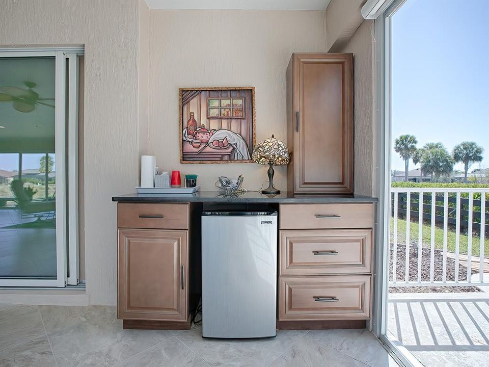 Lovely entertaining area on supersized, enclosed lanai