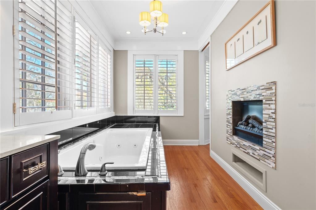 Incredible master bath with double-sided fireplace