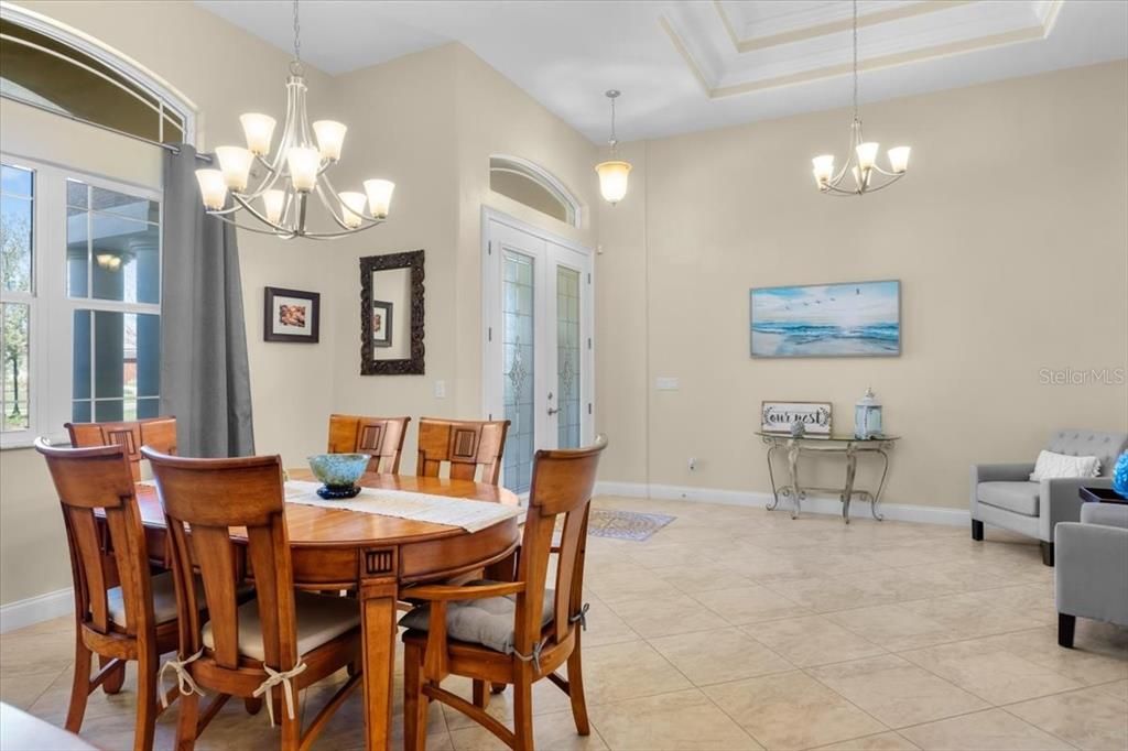 Foyer, sitting area with formal dining area. Open and bright