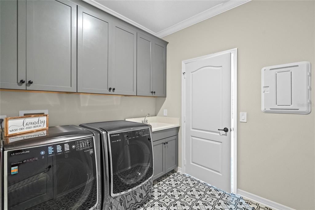 1st Floor Laundry Room with Cabinets