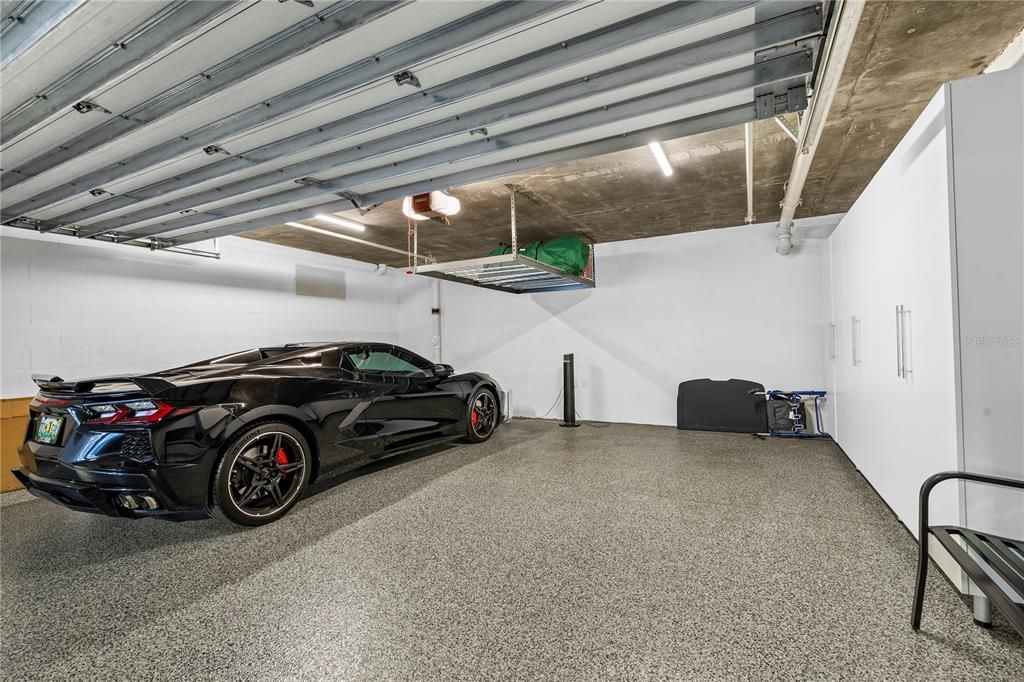 Two Car Garage with Epoxy Floor and Custom Cabinet