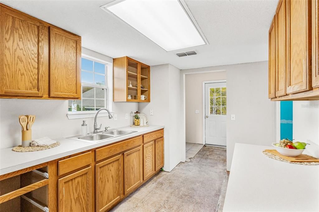 Kitchen leading into Laundry Area