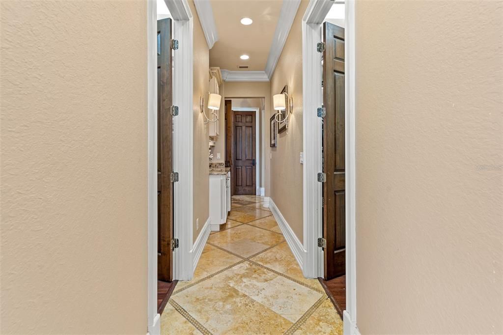 hallway from ensuite bath to dual closets