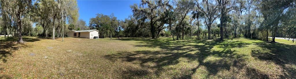 SE corner of home and west / front yard