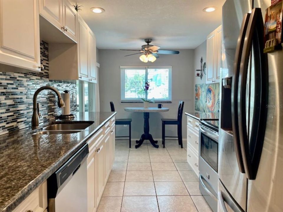 Renovated kitchen with granite countertops