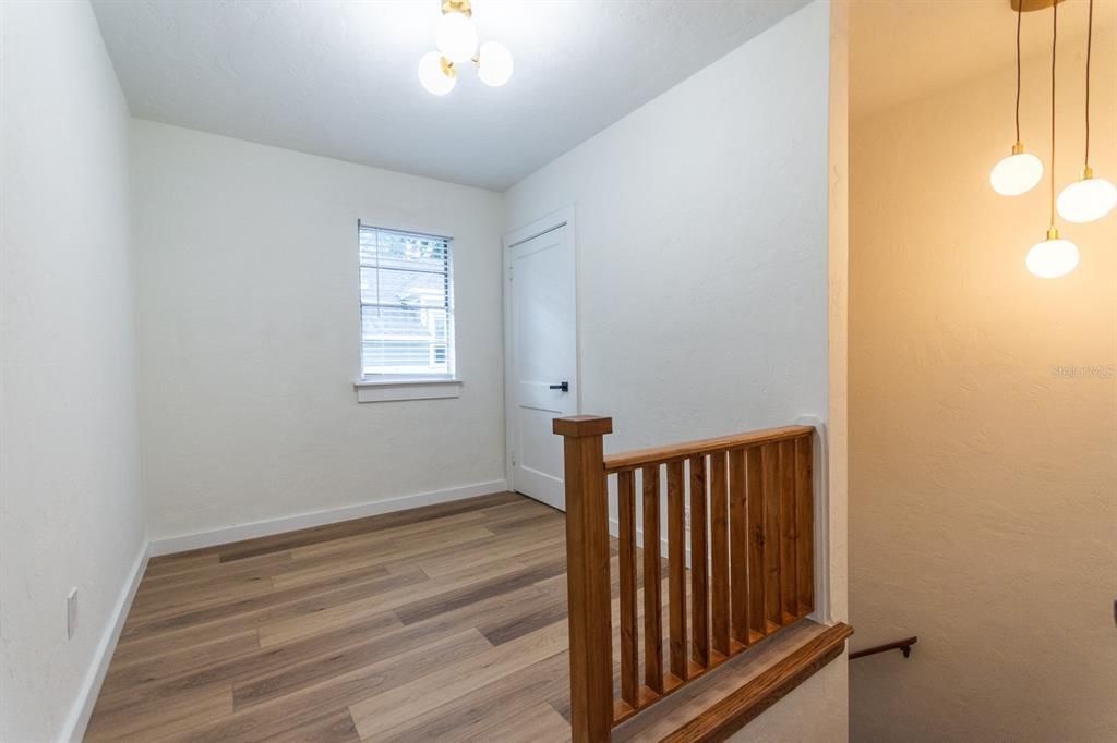 726 top of stairs with storage closet