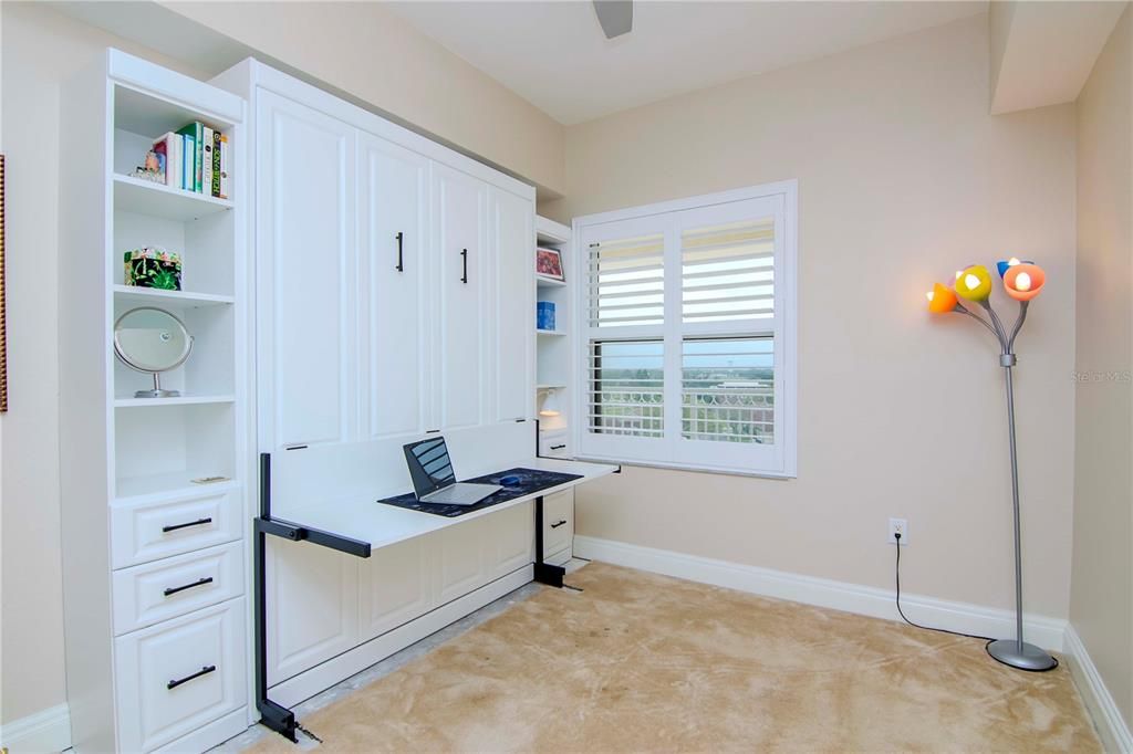 BEDROOM 3 - COMPLETE WITH MURPHY BED AND BUILT IN DESK.