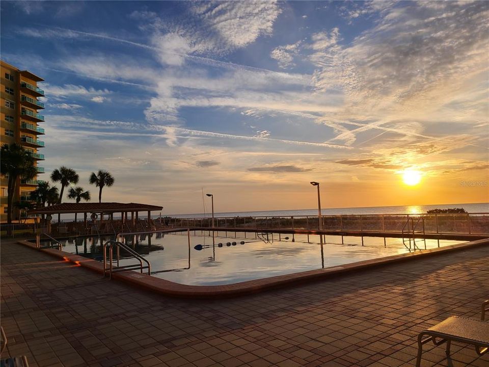 HUGE HEATED POOL right ON the BEACH, plenty of lounge chairs, & it has two LARGE pavilion areas!  Great for enjoying sunsets, if you don't want sandy toes!