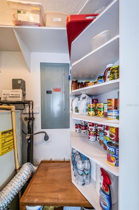 Small pantry in the laundry closet.