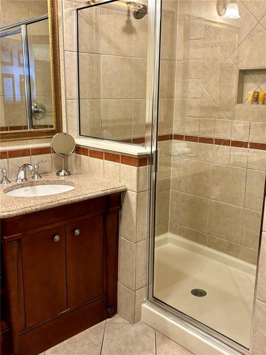 Separate shower stall.