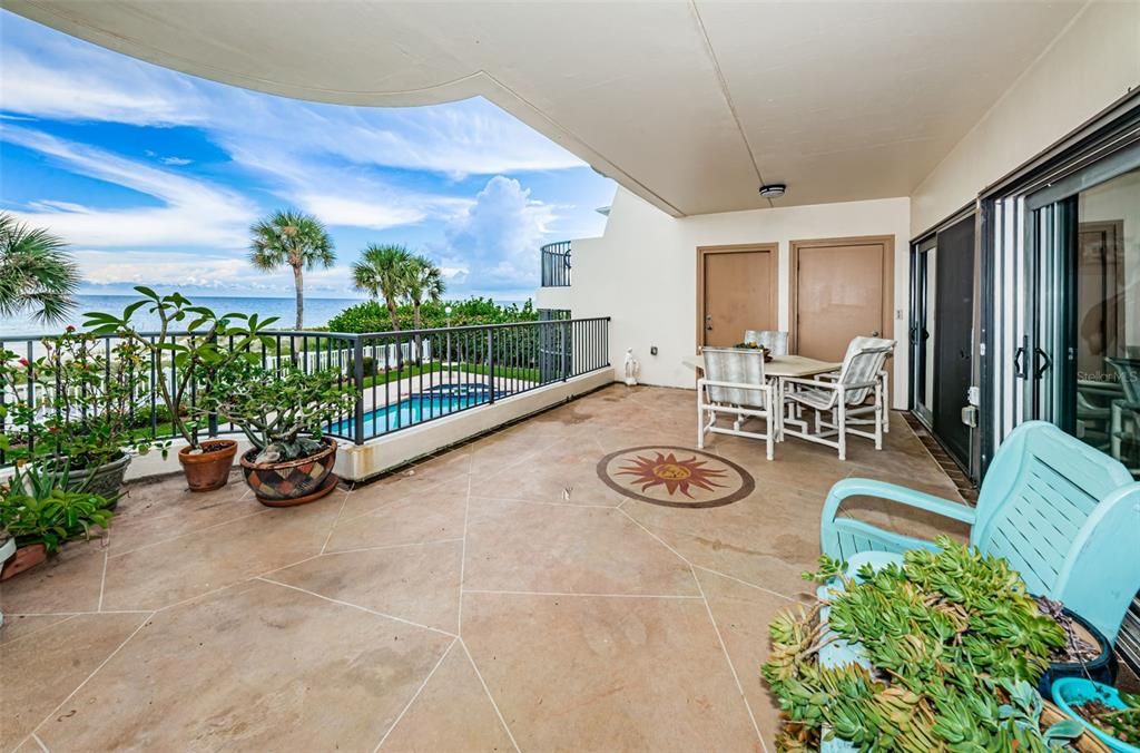 ... Large Gulf Front Terrace .. 23.4 X 12.10  Fronted By a Gorgeous Skyline.. Residence #101 has Balcony Storage thru Right Brown Door and Stairs to Pool Area Thru Left Brown Door.