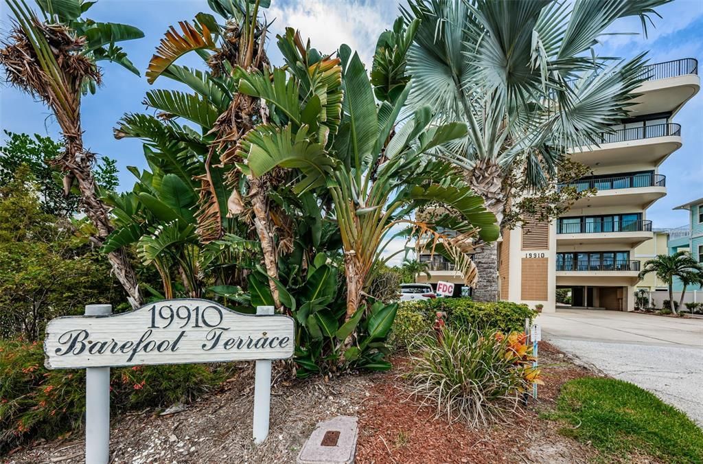 .. Barefoot Terrace - Small Private 7 Unit Complex - Solid Fluted Block - Secured Entrance - Sun Plane Architecture - Extended Gulf front Balcony - Residence # 101..Guest Parking Behind Sign..