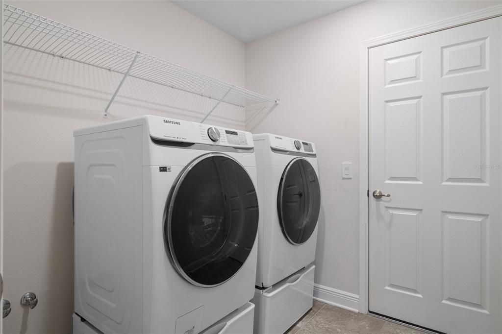 Large Inside Laundry Room, Large inside utilitie room. Washer and dryer stay with home.