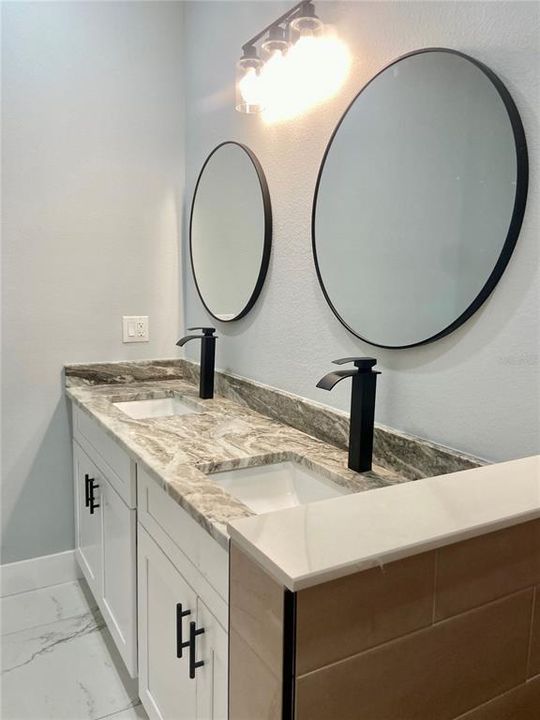 primary bath with double vanity, granite counter tops