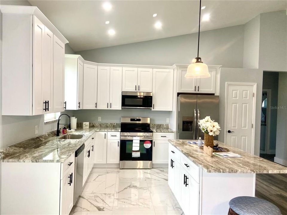 dining area to open kitchen, kitchen island