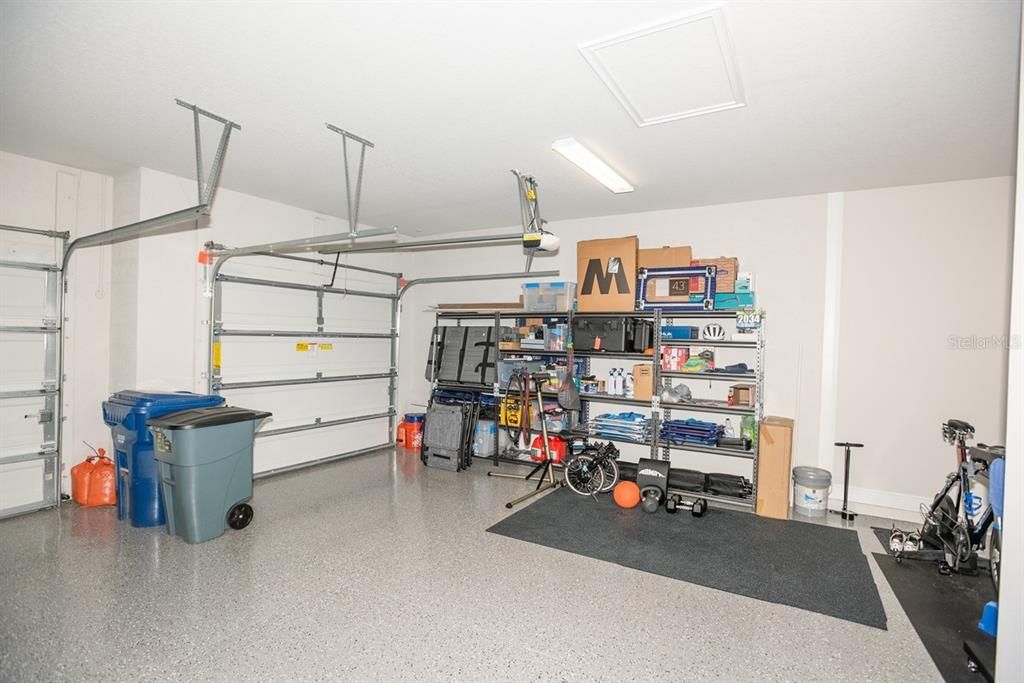 Three car garage with storage area