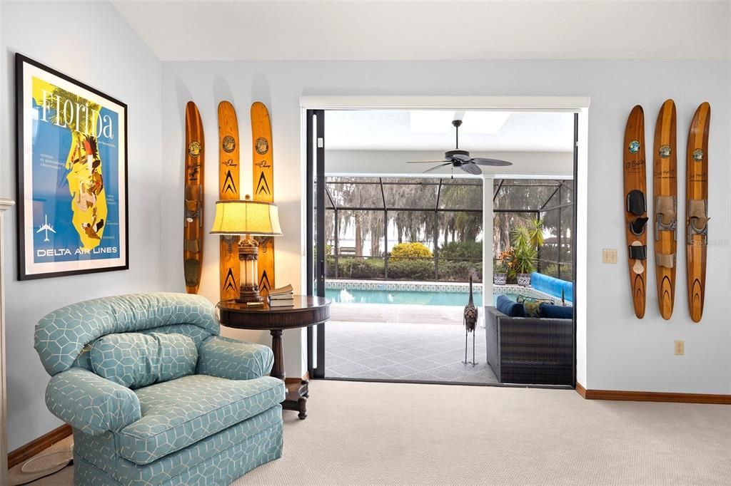 Sliding glass doors open the wonderful lake views to the Primary suite