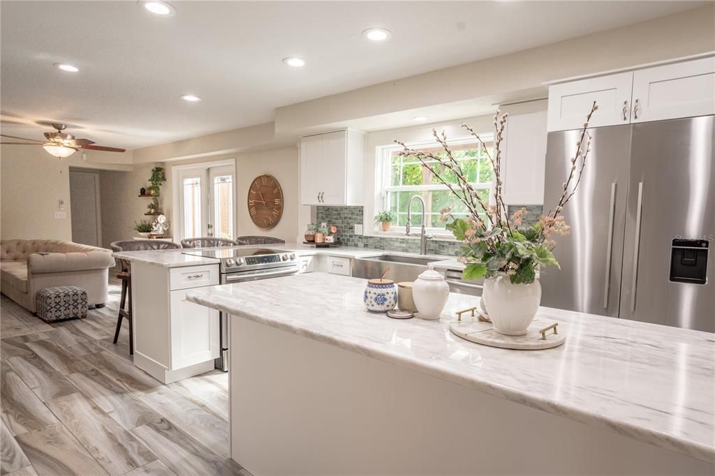 A large kitchen island is ideal for food prep.